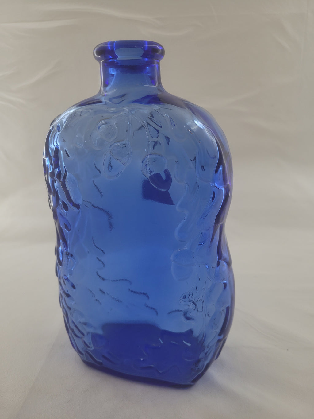 bouteil antique bleu
