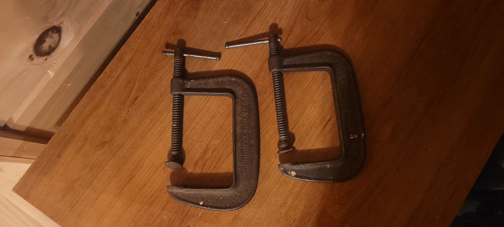 deux serres en c antique