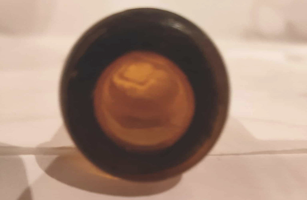 Bouteille antique ambre