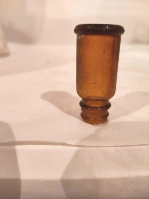 Antike bernsteinfarbene Flasche