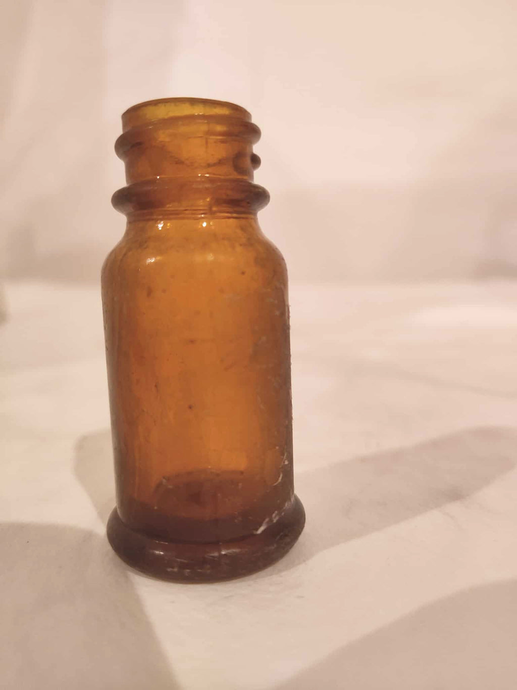 Bouteille antique ambre